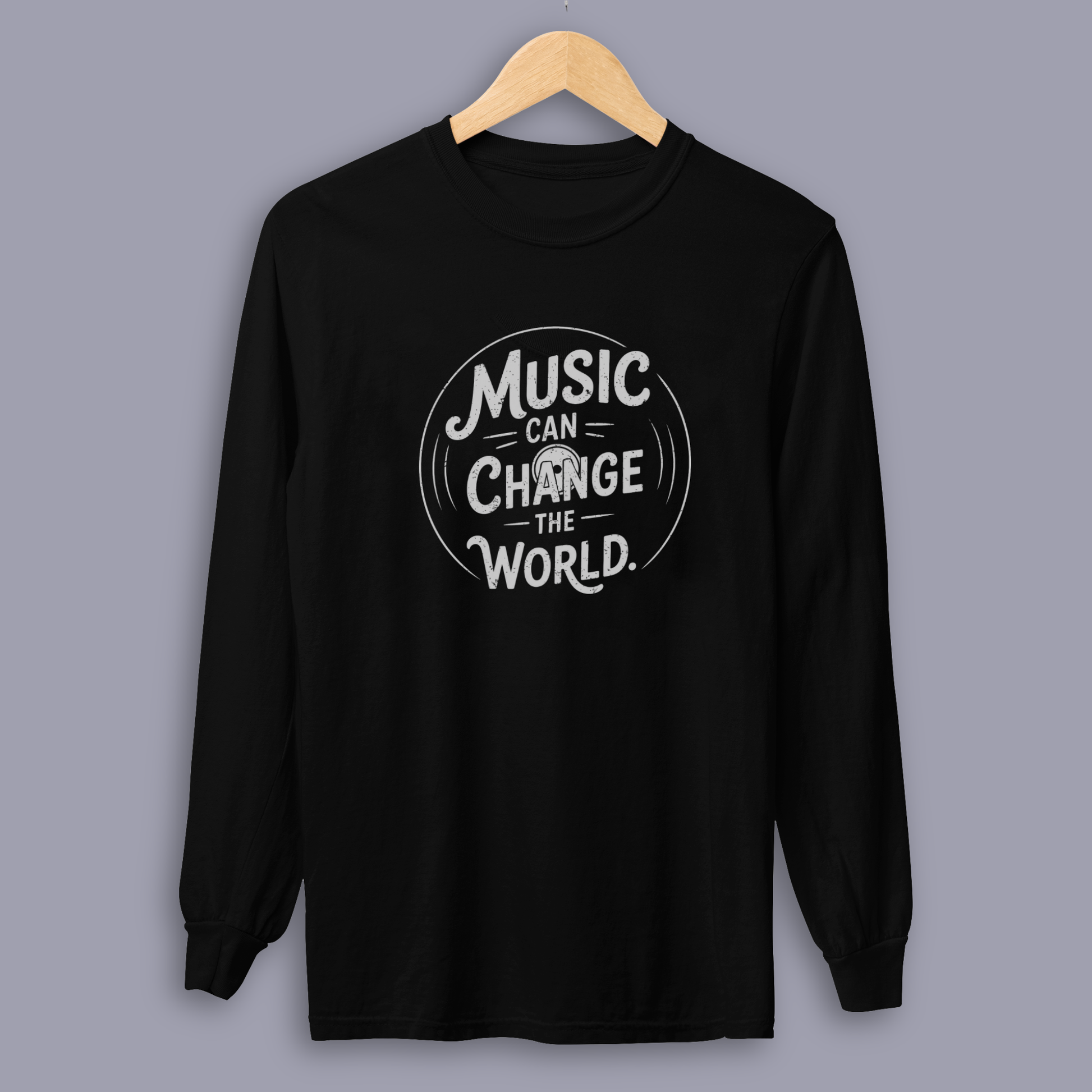Music Can Change The World long sleeve music tee shown on gray mockup