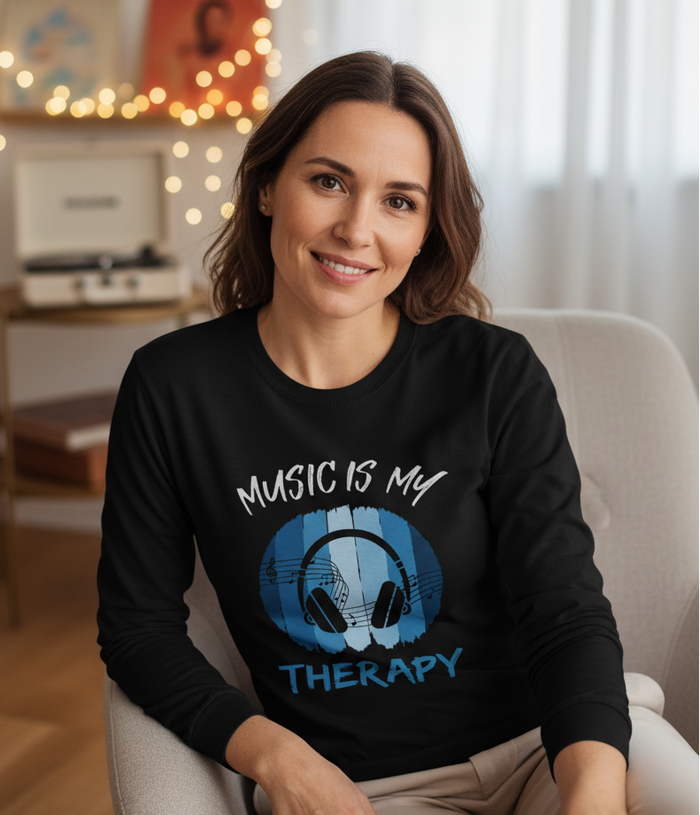 Black long-sleeve shirt with 'Music is my Therapy' design on a gray background